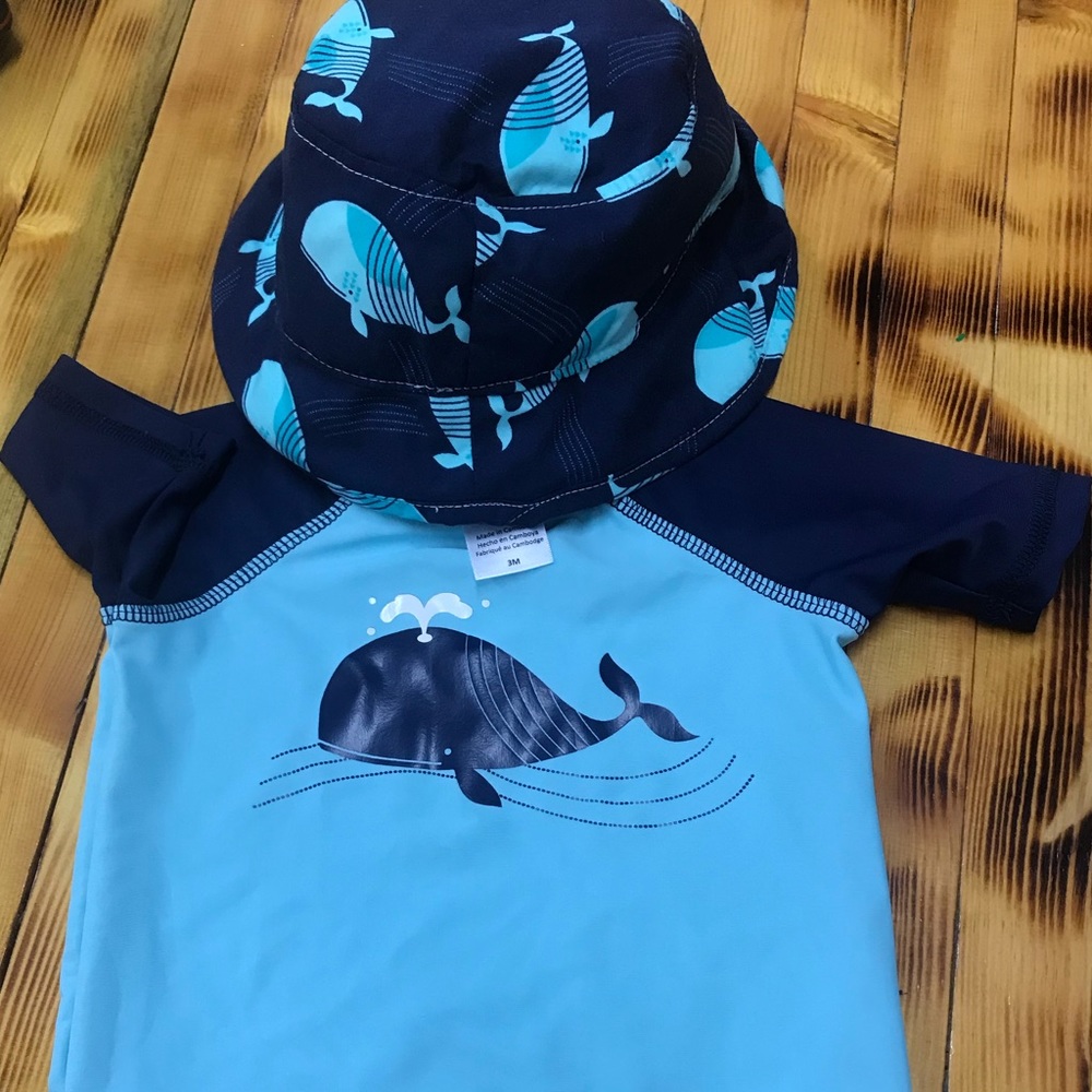 3 month old swim trunks, swim shirt, and hat
